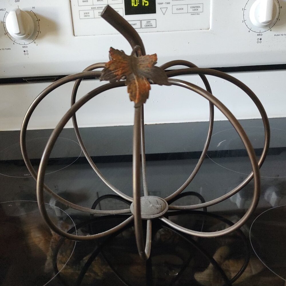 Metal pumpkin votive candle holder